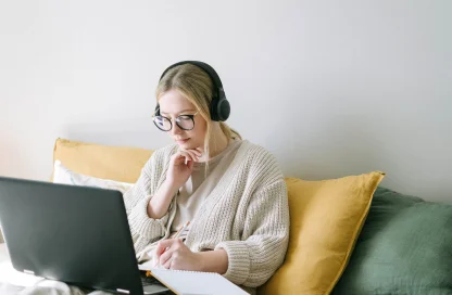 Girl-with-laptop-green-couch