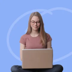 Girl-with-laptop-blue-bg